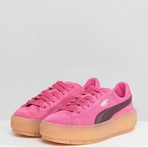 Pink suede platform pumas
